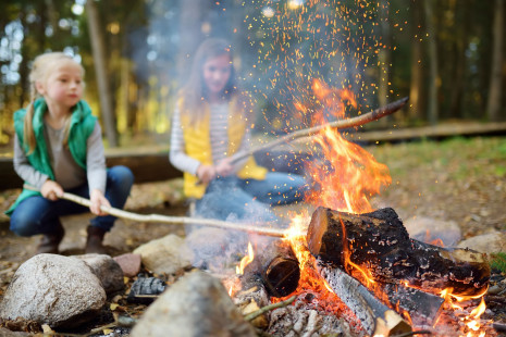 Sisters at bonfire